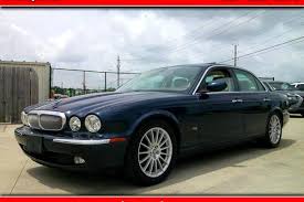 Image result for Black Cherry 2006 Jaguar
