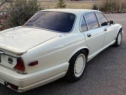 Image result for Nimbus White 1987 Jaguar