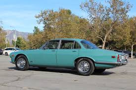 Image result for Turquoise 1973 Jaguar