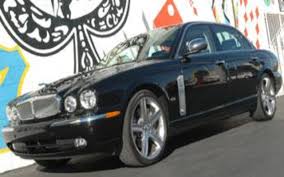 Image result for Black Cherry 2006 Jaguar