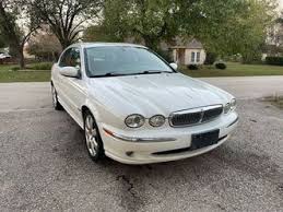 Image result for White Onyx 2002 Jaguar