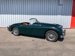 Image result for Dark Green 1959 Jaguar
