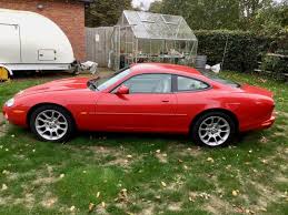 Image result for Phoenix Red 1999 Jaguar