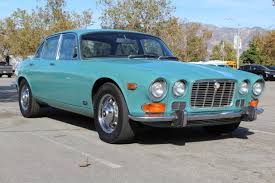 Image result for Turquoise 1973 Jaguar