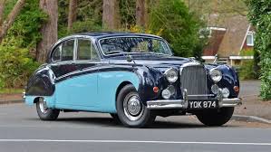 Image result for Silver Blue 1959 Jaguar