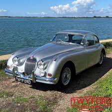 Image result for Silver Blue 1959 Jaguar