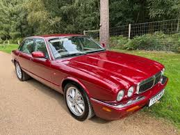 Image result for Carnival Red 1999 Jaguar