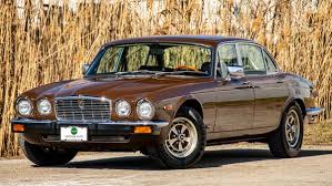 Image result for Carriage Brown 1977 Jaguar