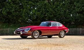 Image result for Maroon 1962 Jaguar