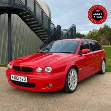 Image result for Carnival Red 2003 Jaguar