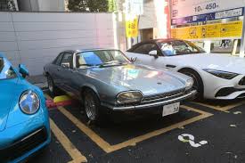 Image result for Glacier White 1989 Jaguar