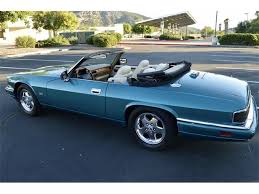 Image result for Bright Turquoise 1995 Jaguar