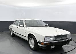 Image result for New Glacier White 1991 Jaguar