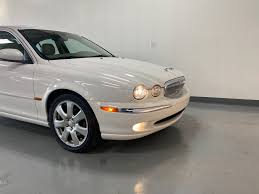 Image result for White Onyx 2002 Jaguar