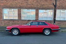 Image result for Sebring Red 1986 Jaguar