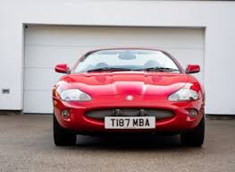 Image result for Phoenix Red 1999 Jaguar