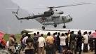 BBC News - India floods: Bad weather delays rescue and mass cremations
