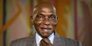 Abdoulaye Wade adjusts his