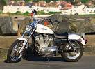 motorcycle in a car park on - via Daymix