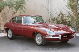 Image result for Maroon 1962 Jaguar