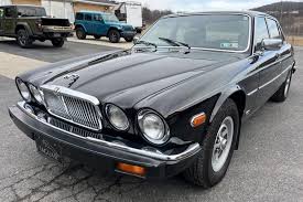 Image result for Poseidon Dark Green 1985 Jaguar