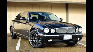Image result for Black Cherry 2006 Jaguar