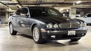 Image result for Black Cherry 2006 Jaguar