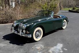 Image result for Dark Green 1959 Jaguar