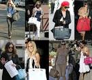 http://www.instablogsimages.com/1/2011/09/26/the_celebrities_with_their_favorite_designer_handbags_kzmhq.jpg