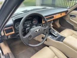 Image result for Glacier White 1989 Jaguar
