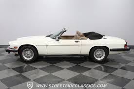Image result for Glacier White 1989 Jaguar