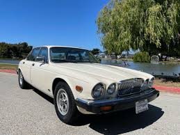 Image result for Nimbus White 1987 Jaguar