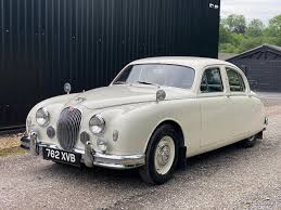 Image result for Old English White 1955 Jaguar