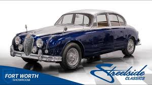 Image result for Maroon 1962 Jaguar