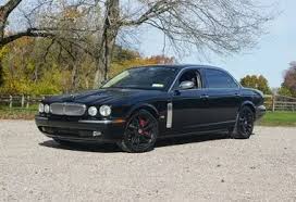 Image result for Black Cherry 2006 Jaguar
