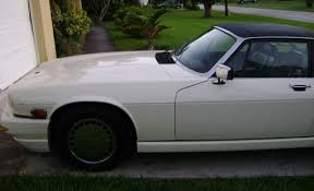 Image result for Nimbus White 1987 Jaguar