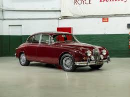 Image result for Burgundy 1983 Jaguar