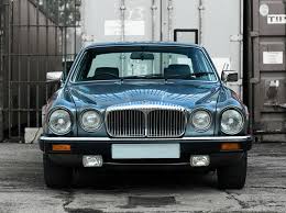 Image result for Poseidon Dark Green 1979 Jaguar