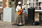 A hardy reggae busker braving - via Daymix