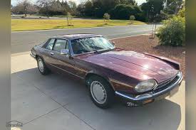 Image result for Burgundy 1983 Jaguar