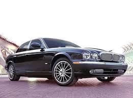 Image result for Black Cherry 2006 Jaguar