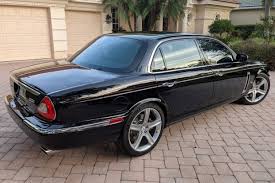 Image result for Black Cherry 2006 Jaguar