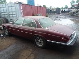 Image result for Burgundy 1983 Jaguar