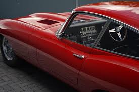 Image result for Maroon 1962 Jaguar