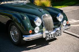 Image result for Dark Green 1959 Jaguar