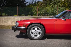 Image result for Sebring Red 1986 Jaguar