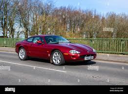 Image result for Carnival Red 1999 Jaguar