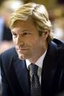 maybe Aaron Eckhart?