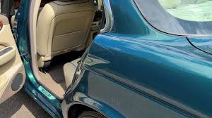 Image result for Black Cherry 2006 Jaguar