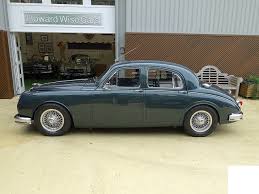 Image result for Dark Green 1959 Jaguar
